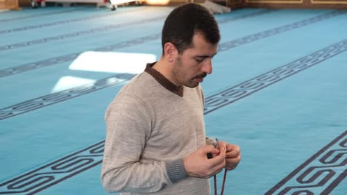 Muslim Praying Rosary