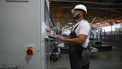 Factory Worker Operating Complex Machine in Urban Setting