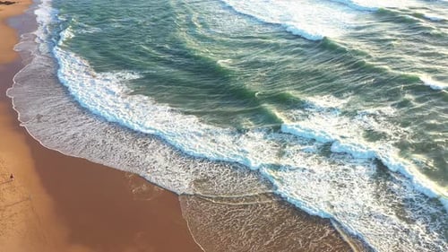Aerial View Beautiful Sea Waves Crashing on Sandy Beach