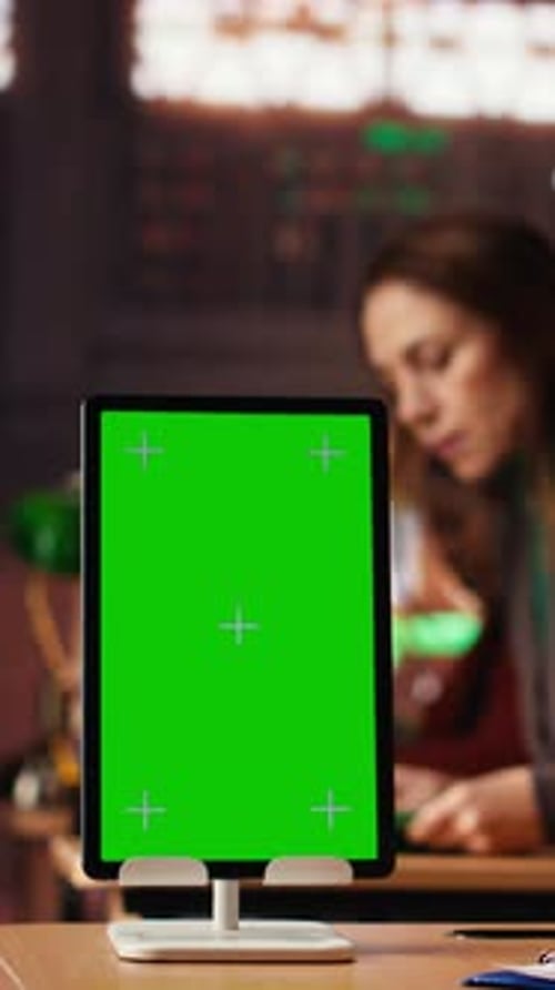 Vertical Video Elderly Adult in a Public Library Studying for Thesis Next to Copy Space Display