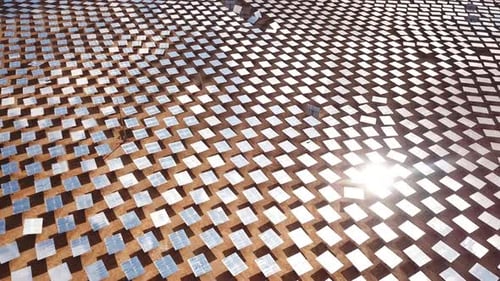 Solar power plant mirrors that focus sun rays upon a collector producing renewable energy