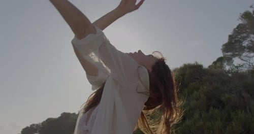 Carefree Boho Female Posing in Nature by Sea