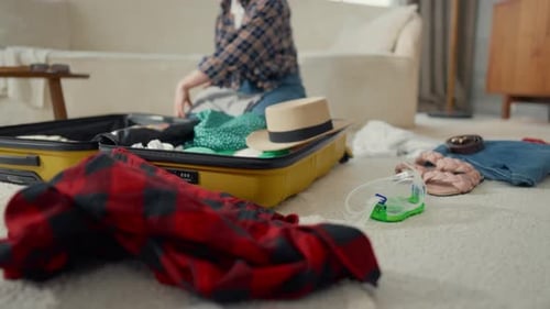 Packaging Suitcase for Travel Clothes on Floor in Living Room Woman Tourist Details View Girl