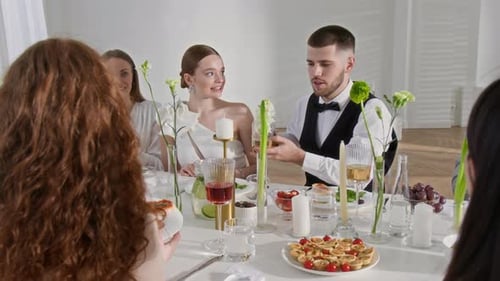 Friends Celebrate Wedding at Elegant Indoor Venue