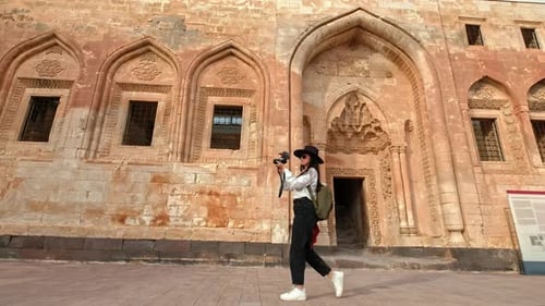 Woman Walking In A Historical Place And Taking A Video