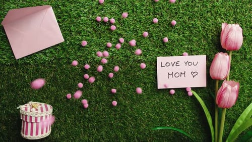 Love You Mom Note on Green Grass with Gift