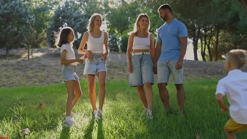 Family Enjoying Leisure Time in a Park