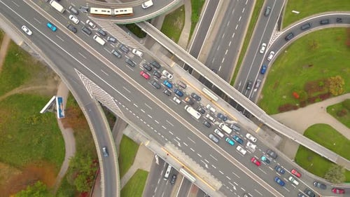Aerial shot of elevated road junction. Drone footage of top view of Highway road junctions. The Inte