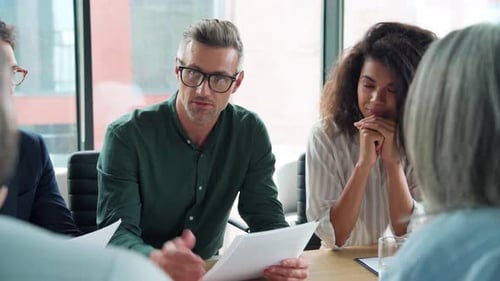 Business Meeting Collaboration in Modern Office Setting