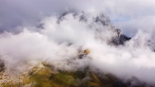 Rocky Peak In The Clouds