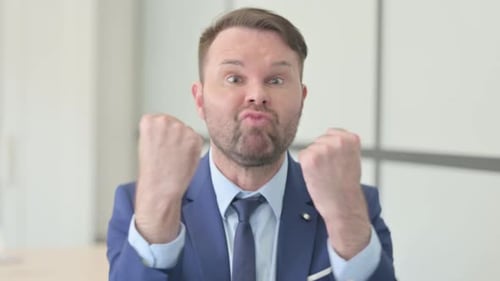 Adult Man Gesturing and Communicating in a Blue Suit