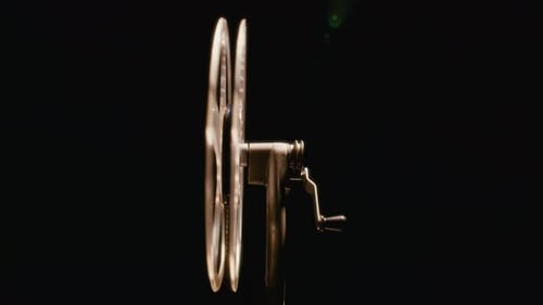 Rotating Film Reel in Golden Light