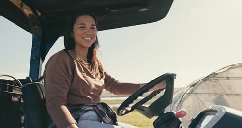 Farmer portrait, woman and tractor for agriculture transport, farming and field in sustainability