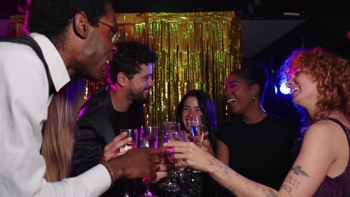 Friends Celebrating with Champagne at Party