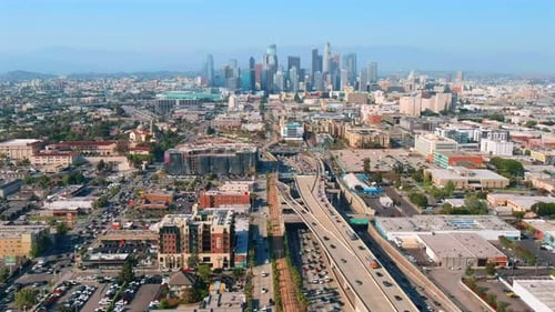Downtown Los Angeles with residential buildings and business skyscrapers, establishing cityscape, su