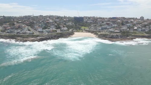 Tourists At The Beautiful Tamarama Beach In Summer. Tamarama Point And Mackenzies Bay In Eastern Sub