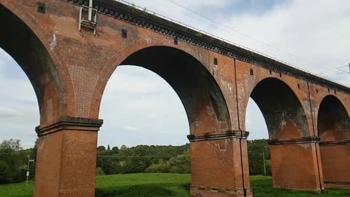 Sweeping view of a grade II listed, Victorian, Railway Viaduct showing it disappearing into the dist
