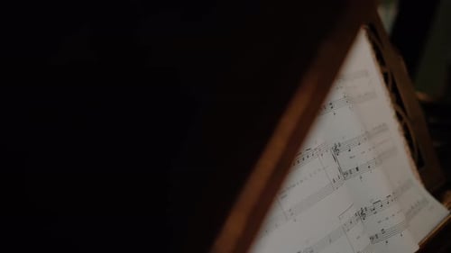 Close-Up of Sheet Music on Music Stand