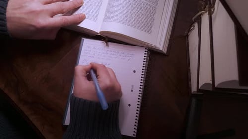 Adult Writing in a Notebook, Open Book