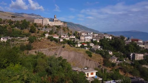 Aerial drone view of the old castle and fortress of the city of Gjirokaster or gjirokastra, Albania.