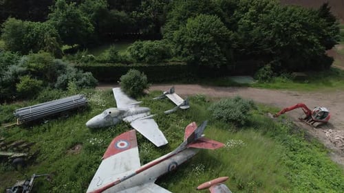 Aerial approach to the abandoned De Havilland Vampire, and F.6 Hawker Hunter vintage military aircra