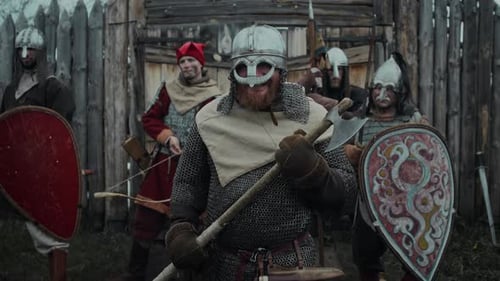 Medieval Warriors in Chainmail Armor with Weapons
