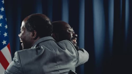 Politicians Celebrate Victory on Stage