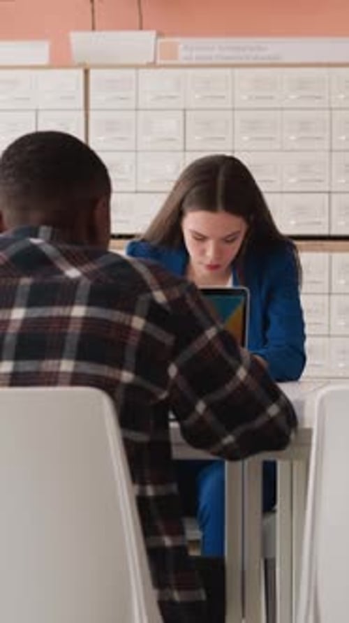 Visitors Work on Computers in Library Hall
