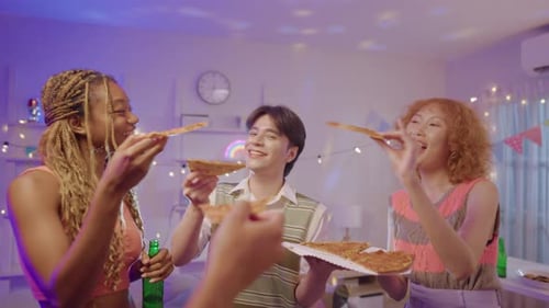 Friends Sharing Pizza at a Casual Home Party