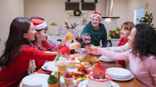 Family Christmas Celebration with Toast in Home