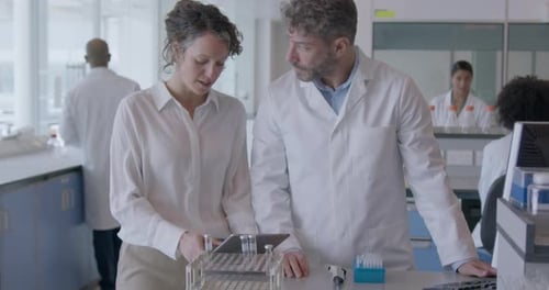 Scientists Working Together in a Modern Laboratory