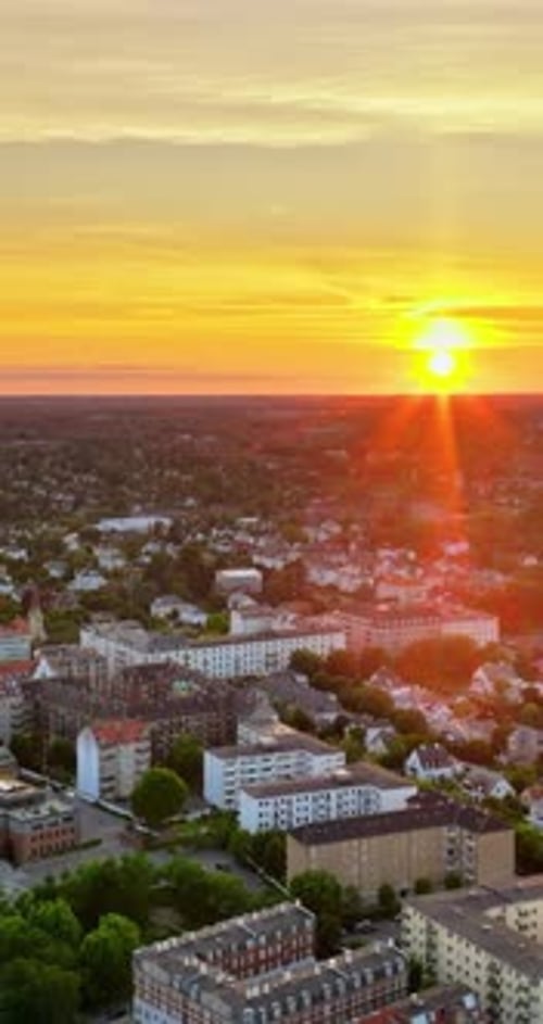 Aerial drone view of Osterbo Nord, Nordhavn at sunset. Vertical