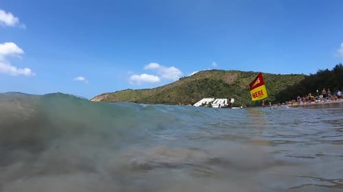 Wave breaks on the beach
