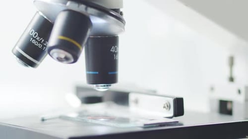 Closeup of Scientific Microscope Laboratory in Hospital Epidemic Disease Healthcare Vaccine Research