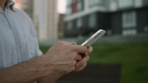 Close Up Male Hands Holding Mobile Phone Smartphone Cellphone Telephone Online Internet Businessman