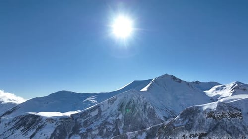 Aerial view of beautiful snowy mountains in Gudauri, Georgia