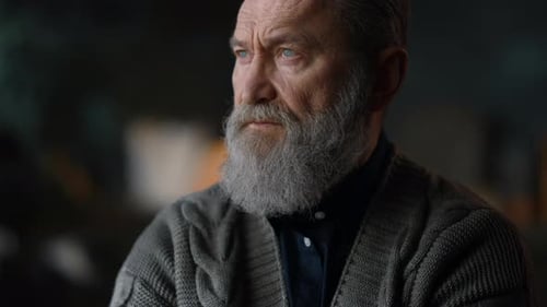 Thoughtful Senior Man Portrait. Portrait Focused Elderly Man Thinking About Life At