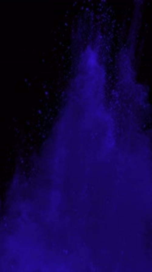 Purple Powder Exploding on Black Background Vertical Video