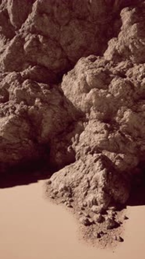 Majestic Rock Formation Amid Sandy Beach
