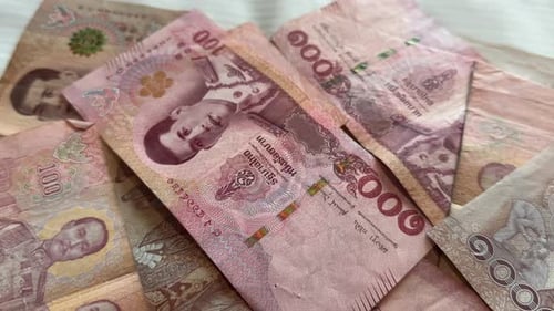 Thailand thai baht money cash currency notes and bills THB