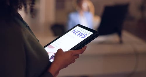 Woman Browsing Tablet at Home