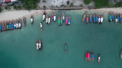 Tropical Landscape Over Tropical Sea Beach with Long Tail Boats Stands on Seashore on a Sandy Beach