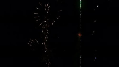 Great fireworks festival at the end of the year to celebrate the new year. Vertical video