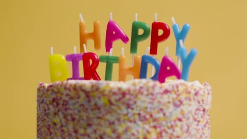 Colorful Birthday Cake with Happy Birthday Candles