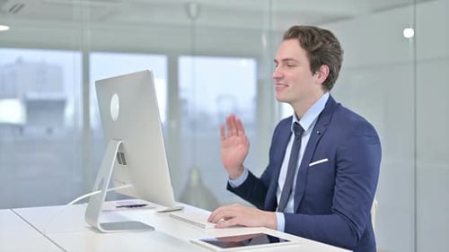 Young Adult Video Conferencing in Office Environment
