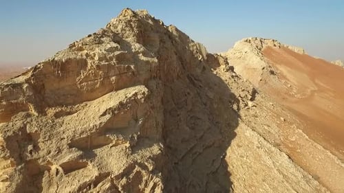 Majestic Rocky Mountain in the Desert with Breathtaking Aerial View