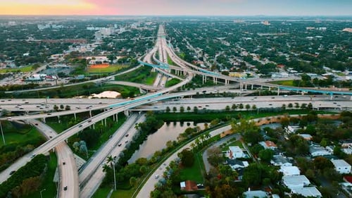 Freeways and highways crossing and intertwining in the downtown of the metropolis.
