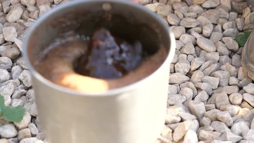 Close up of Boiling coffee on fire