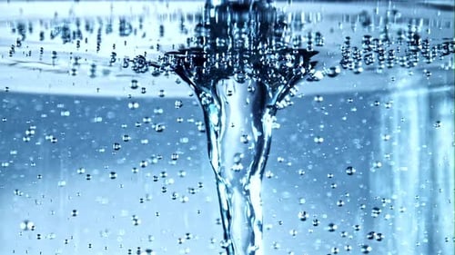 Super Slow Motion Water Funnel with Air Bubbles Under Water