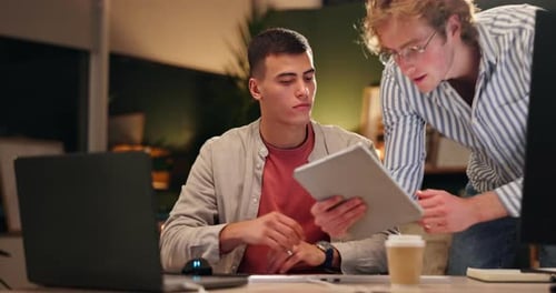 Office, business people and consulting with tablet at night for software development